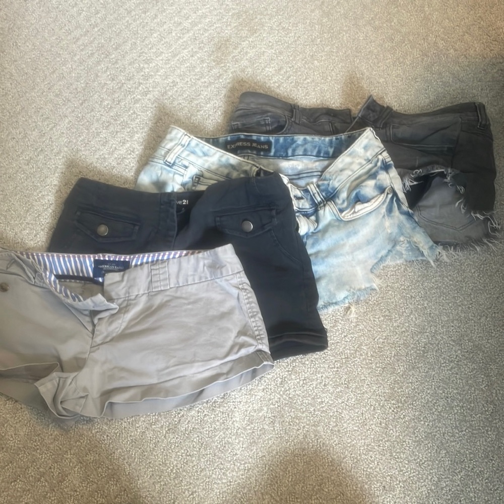 4 pairs of shorts, 2 jean shorts 2 normal fabric shorts
